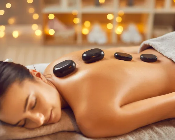 Hot Stone Massage Service in Padur at Tula Unisex Salon and Spa